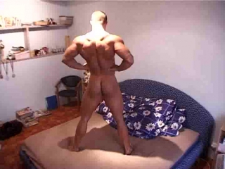 bodybuilder thomas doing a very private naked flexing show